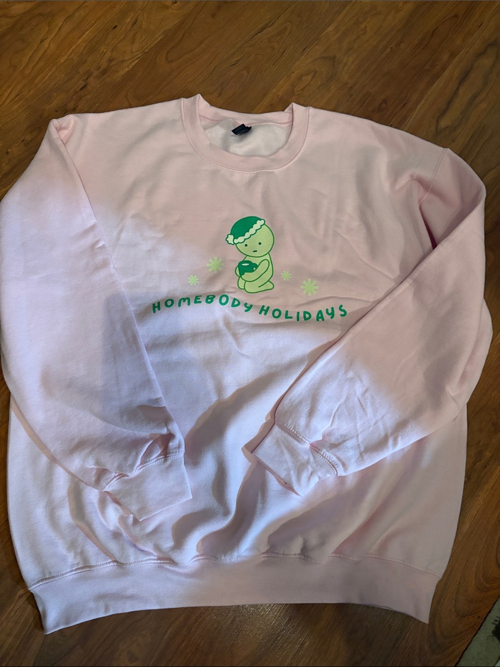 Pink Holiday Sminski Crewneck Sweatshirt with Green Character